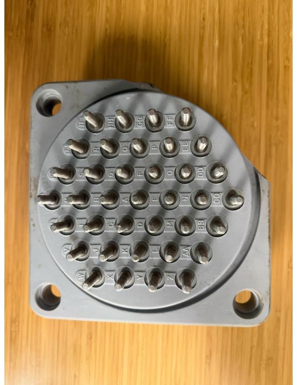 Original OEM cast phenolic CT passthrough block from the Orlando Utilities Commission transformer, the type that cracks when terminal connections are tightened