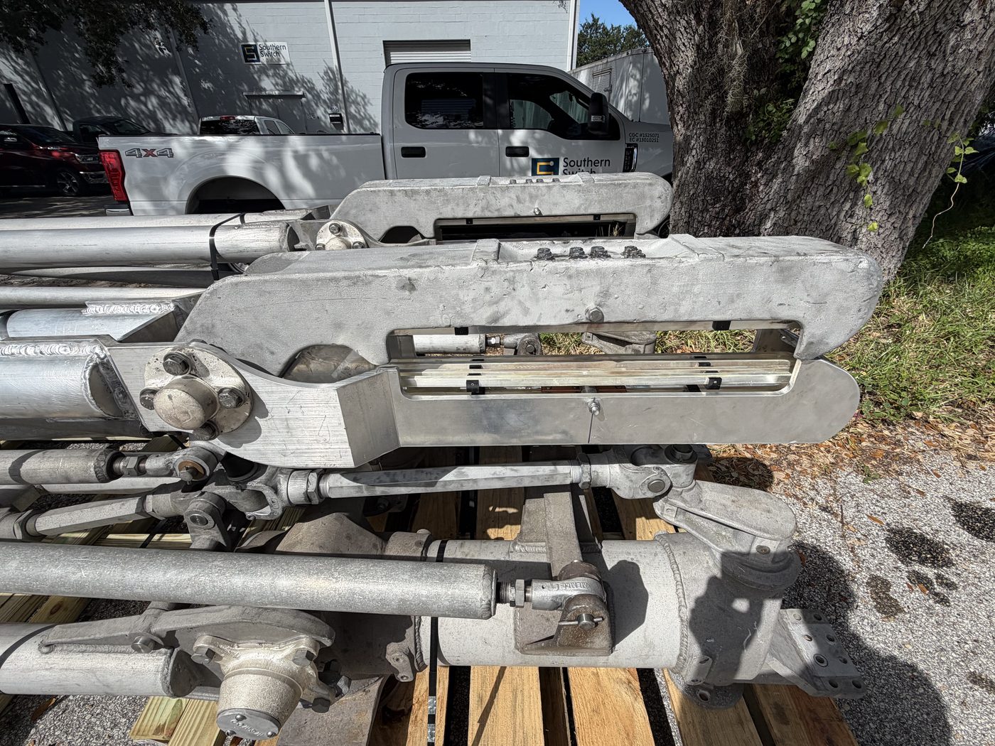 500 kV pantograph disconnect switch set on pallets at Southern Switch facility, ready for rebuild.