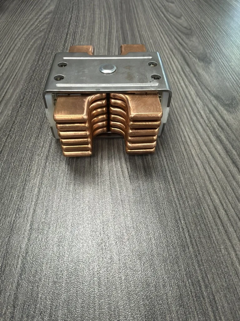 Reinhausen RMV-II reversing switch moving contact assembly, copper contact fingers on the machined frame