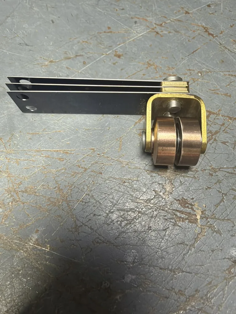 Waukesha UZD roller arcing contact, copper rollers on the brass bracket with black insulated contact arms