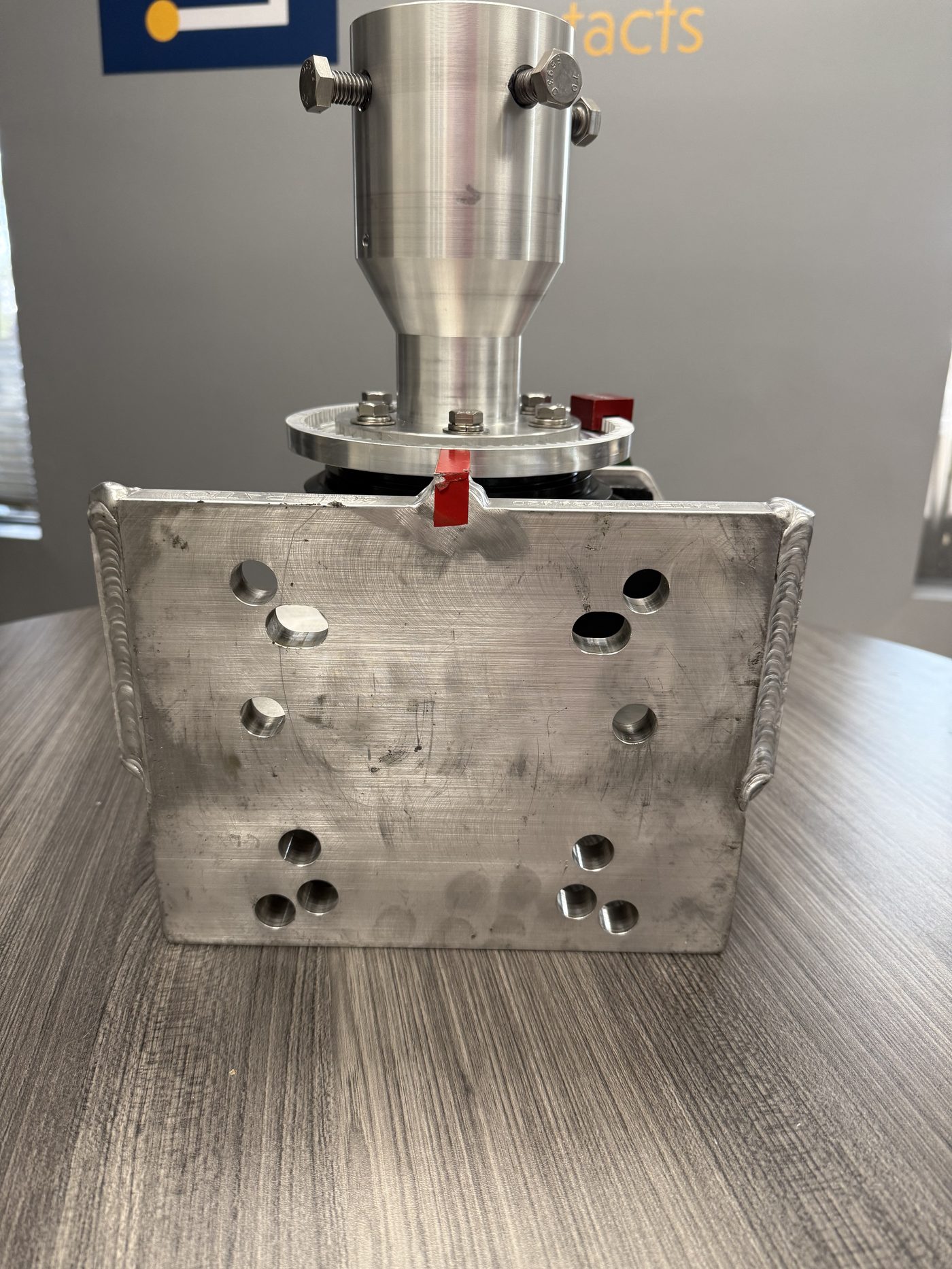 UGOR universal mounting backplate, machined aluminum with mounting hole pattern compatible with existing switch structures